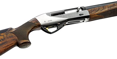 (66cm) Steelium barrel, three-shot tube, and a nickel-plated receiver that includes an upland game scene which unfortunately does not include any chukara minor, but immediately visible flaw. . Beretta a400 upland vs benelli ethos